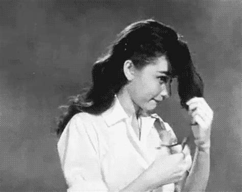 Audrey Hepburn Cutting Her Hair Rific