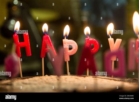 Burning Happy Birthday Letter Candles On Cake Close Up Stock Photo Alamy