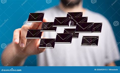 Man Pointing Toward Floating 3d Rendered Envelopes Concept Of