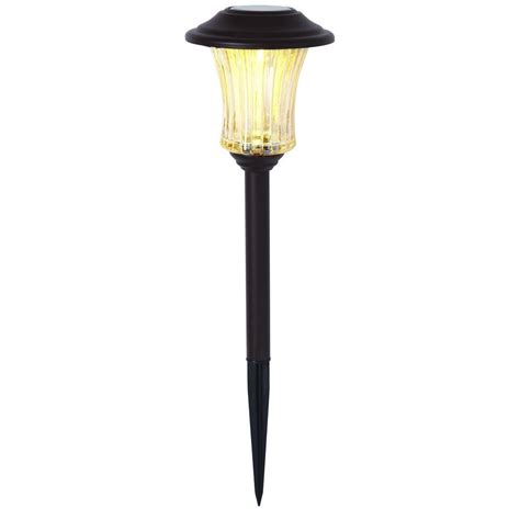 I only had them out in the sun for about half the recommended time, but by sunset they were fully charged, and a delight to see fully lit up out back. Hampton Bay Solar Powered LED Bronze Outdoor Pathway Light ...