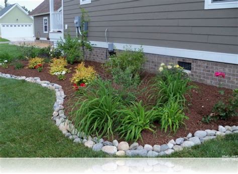 simple rock garden ideas with white river stone border