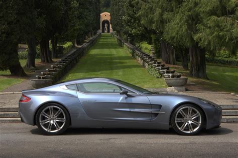 The driver's door swings out and arcs gently upwards, just like it might on a db9 or new vanquish, but the slow, expensively gloopy motion is gone and instead the door zips away from you like a lost helium balloon. Aston Martin One-77 Wallpapers Images Photos Pictures ...
