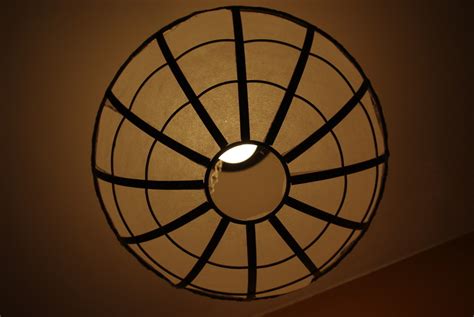 All you would be needing is a large tulle, a light bulb, an embroidery floss, embroidery needle, safety pins, and a cutting mat. Ceiling Light Fixture Cheap! · How To Make A Lamp ...
