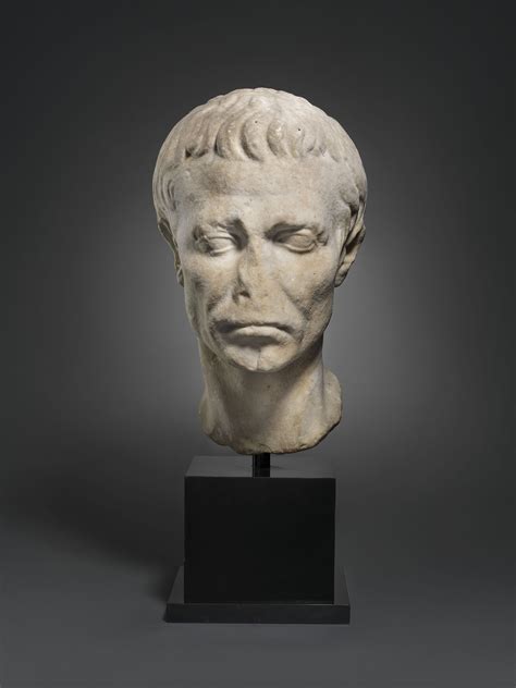 A ROMAN MARBLE PORTRAIT HEAD OF JULIUS CAESAR