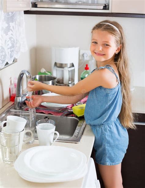 Little Girl Housekeeping Doing Dishes Stock Photos Free And Royalty