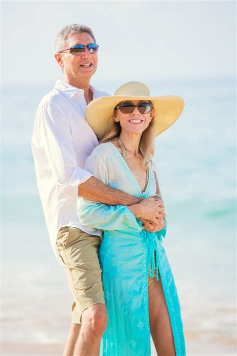 Romantic Couple Walking On The Beach Stock Photo Image Of Middle