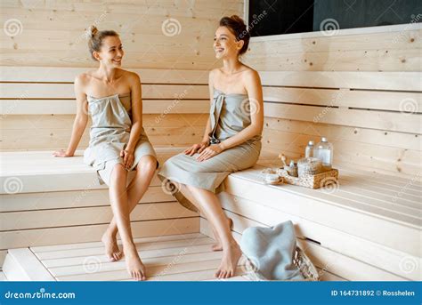 Two Girlfriends Relaxing In The Sauna Stock Photo Image Of