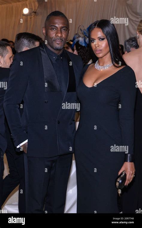 Idris Elba And Sabrina Dhowre Walking On The Red Carpet At The