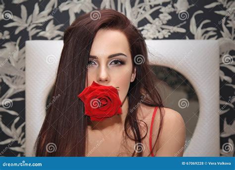 Portrait Of A Young Woman With Rose In The Mouth Stock Photo Image Of