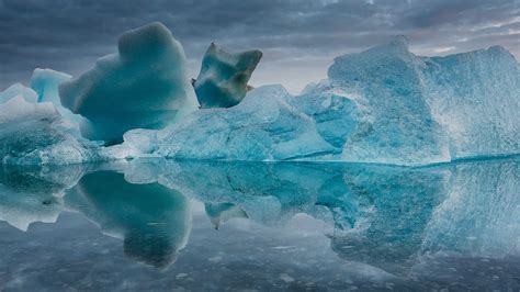 Icebergs Melting In The Midsummer Night At Jökulsárlón Iceland