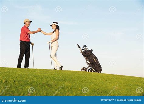 Golfer And Caddie Playing Golf Stock Image Image Of Leisure Outdoors 90090797
