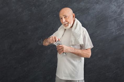Thirsty Senior Man Drinking Water From Bottle Stock Image Image Of Healthcare Muscular 114643321