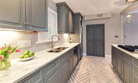 Gray cabinets are popular right now, as are navy kitchen cabinets. Gray Kitchen Cabinets (Design Ideas) - Designing Idea