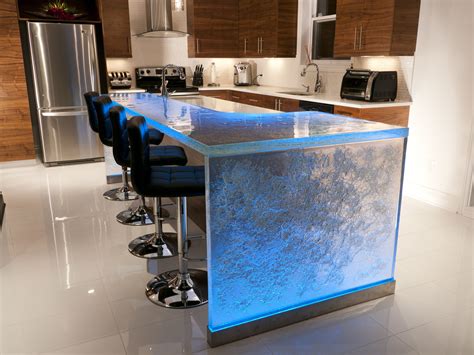 Beautifully Textured Raised Bar With Waterfall Leg And Led Lights Make Your Kitchen
