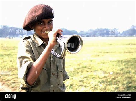 Soldier Boy Playing A Bugle On The Maidan In Calcutta West Bengal India