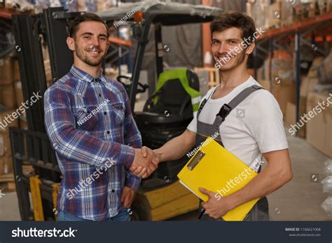 Customer Worker Making Handshake Warehouse Good Stock Photo 1166621068