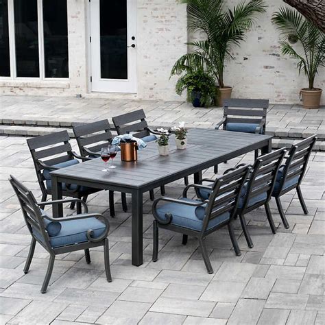 This nine piece set is made of dark, variegated, brown wicker accented by all weather creamy, beige colored sunbrella cushions. Reserve 9-piece Dining Set | Outdoor dining set, Outdoor ...