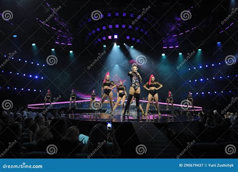 Olya Polyakova And Her Band Singing And Dancing On Stage During Concert Beauty Pageant Miss