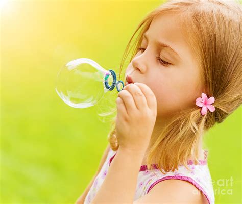 Little Girl Blowing Soap Bubbles Photograph By Anna Om