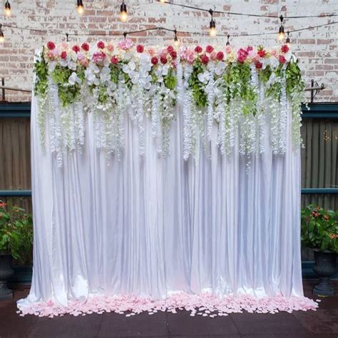 Ceremony Backdrop With Hanging Flowers Centrepiece Bouquet