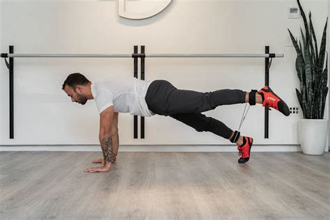 Raise One Leg Straight Up Without Bending The Knee Resistance Band Ab Workout Resistance