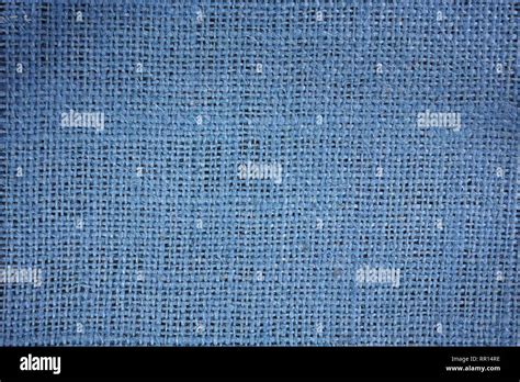 Blue Dyed Burlap Fabric On A Black Background Stock Photo Alamy