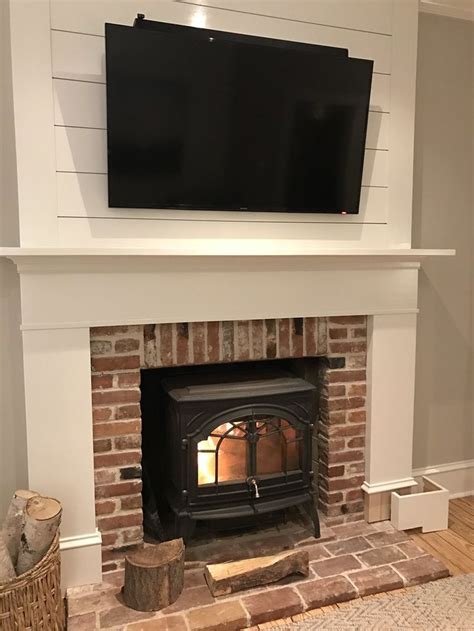 This gorgeous and moveable diy fireplace would look amazing in a bedroom. A Custom DIY Fireplace Mantel Beneath Our Shiplap - Old ...