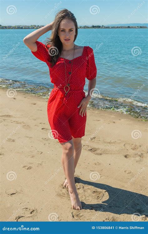 Brunette In Red On A Beach Stock Image Image Of Woman 153806841