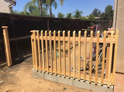 Build A Fence Using Cinder Blocks As The Base All The Wood Was