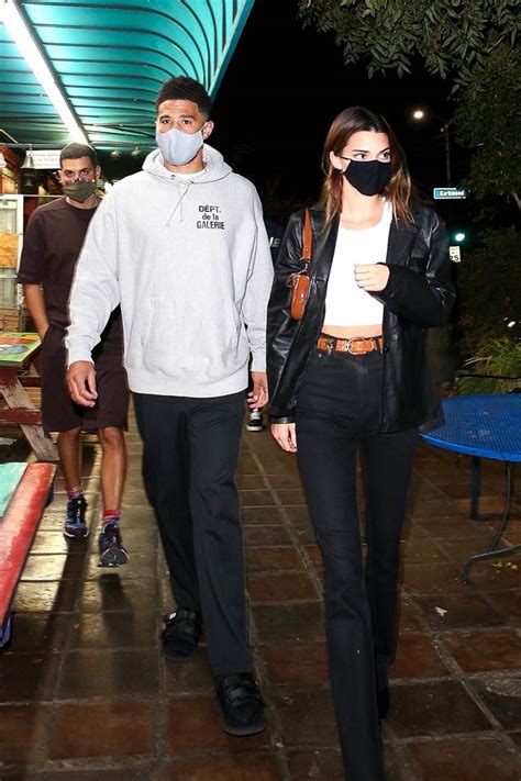 Jenner posted a sweet photo of the two laying across a countertop and she has a huge smile on her face covered by one of her hands. Kendall Jenner | azlyrics.li