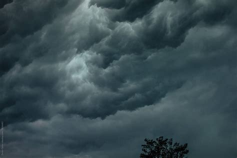 Dramatic Storm Dark Rainy Clouds Moving Over The Sky By Stocksy