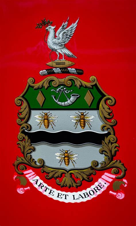 The Coat Of Arms And Crest On A Red Background With Two White Birds
