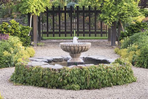 Enjoy the sight and sound of a beautiful waterfall in your 7 beautiful backyard waterfall ideas. Make a splash with a backyard fountain | The Seattle Times