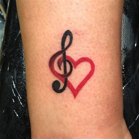 A tattoo of this size can be placed anywhere, but the most popular areas tend to be on the ankle, the wrist or behind the ear. Music Note Music Symbol Tattoo Designs - tattoo design