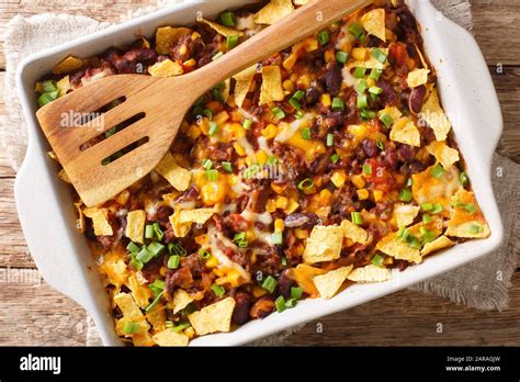 Freshly Baked Frito Pie With Ground Beef Cheese Corn Beans And Chips