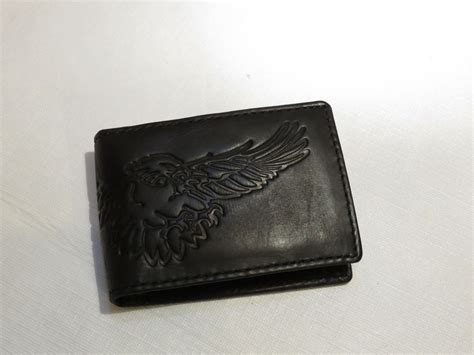 This is a review for a fossil magnetic money clip wallet. Storm money clip black eagle Men's wallet Fossil card ID bifold flip magnetic | Clothing, Shoes ...