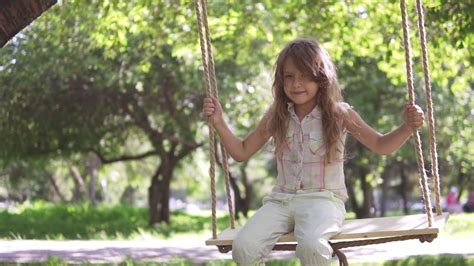 Child Enjoying Swing In Summer Park Joyful Stock Footage Sbv 316464111