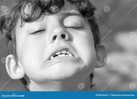 Kid Making Strange Facial Expressions Stock Image Image Of Goofy