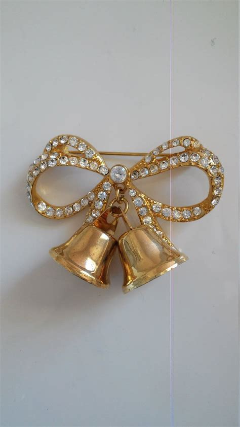 Monet Bows And Bells Brooch Crystal And Gold Bow Pin Bows And Etsy Vintage Costume Jewelry