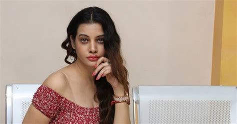 beautiful indian queen diksha panth stills in red dress at pre release event tollywood boost