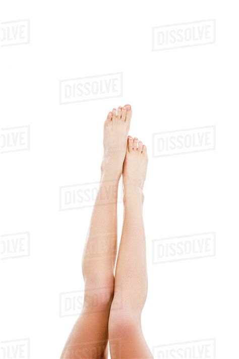 Cropped View Of Woman With Barefoot Legs Isolated On White Stock