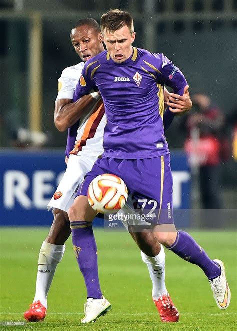 Romas Midfielder From Mali Seydou Keita Vies With Fiorentinas