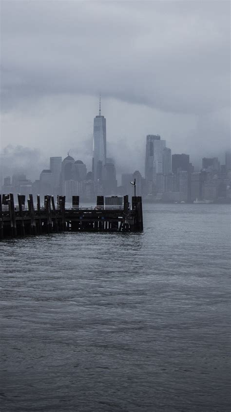 Cloudy Manhattan Skyline Wallpaper Backiee