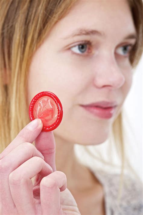 Woman Holding A Condom Photograph By Lea Paterson Pixels