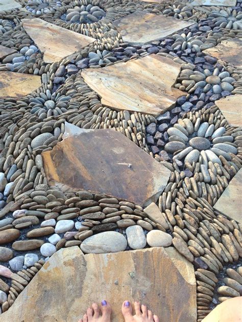 Browse our large selection of pebble tiles, pearl tiles and find the perfect natural stone tile for your project. Pebble river rock flagstone mosaic walkway patio ...
