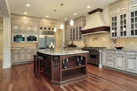 Antique white kitchen cabinets are extremely versatile. #Kitchen of the Day: Large, luxury design with antique ...