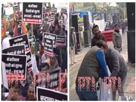 arvind kejriwal istifa do slogan sought by bjp aap protesters tearing posters in delhi video