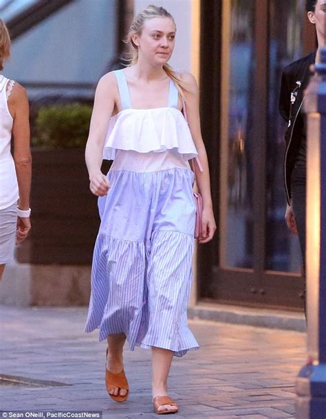 Dakota Fanning Goes Make Up Free On Evening Stroll After Flight From