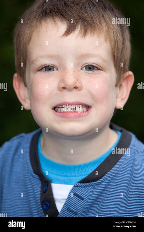 A Young Boy Shows Off His Missing Front Tooth Stock Photo Alamy
