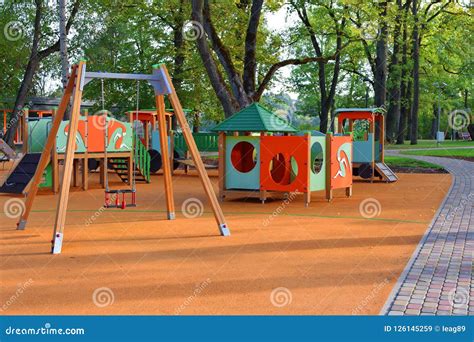 Colorful Playground With Swings And Slides Stock Image Image Of